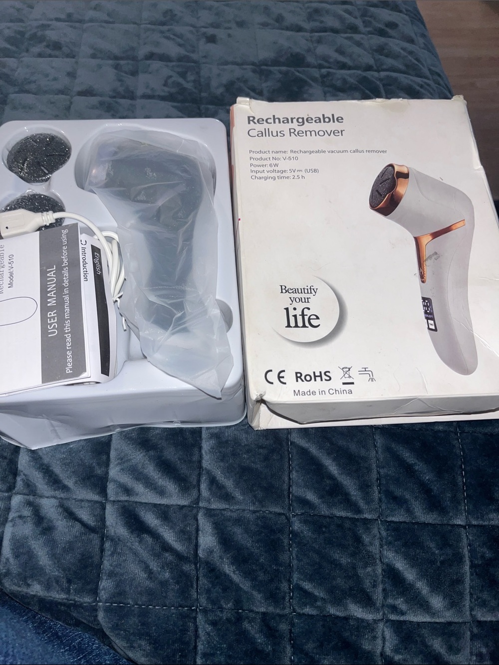 Rechargeable Callus Remover in White with Rose Gold Accents